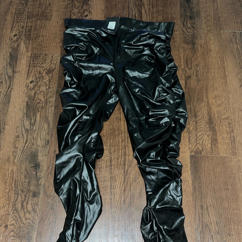Heat wave faux leather stacked pants